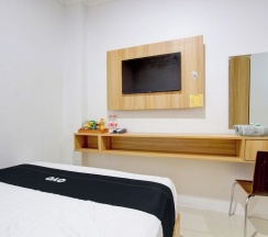 Люкс Deluxe в Capital O 93266 Palmier Hotel