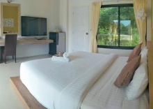 Двухместный номер Standard с балконом двуспальная кровать в Suwi CoCo Ville Resort