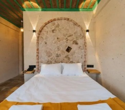 Двухместный люкс двуспальная кровать в La Casa Cave