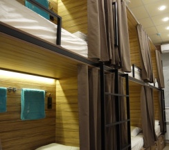 Кровать в общем номере в Стерео