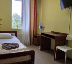 Одноместная комната с общей ванной комнатой в Орловский дом