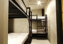 Кровать в общем номере в Here Hostel