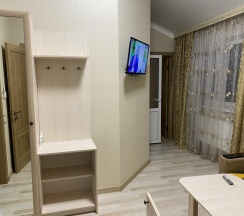 Четырёхместный номер Семейный с красивым видом из окна в Дом Гостей