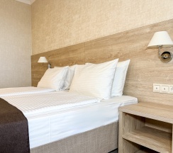 "Стандарт" Стандартный трехместный номер с 2 отдельными кроватями и дополнительным местом в Диона