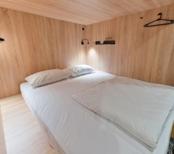 Двухместная капсула в общем номере (общие удобства) в Wellhome