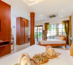 Двухместное бунгало Deluxe с видом на сад двуспальная кровать в Club Bamboo Boutique Patong Beach Resort