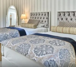 Четырёхместный семейный люкс в Salonika Suites