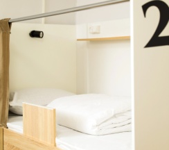 Кровать в общем номере в Yassi Hostel