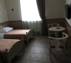 Номер улучшенный с 2 односпальными кроватями в Серая лошадь