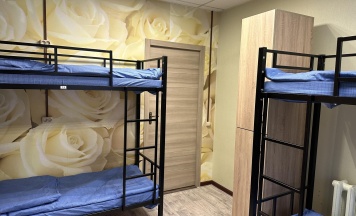 Кровать в 6-местном общем женском номере в Точка