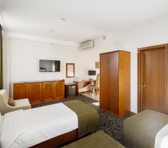 Стандарт трехместный с отдельными кроватями в Бенефит Плаза