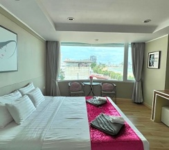 Номер Deluxe в The Beach Front Resort Pattaya  - SHA Plus