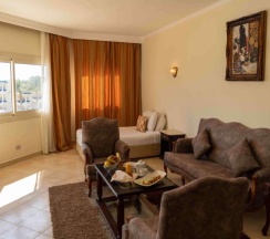 Люкс с видом на бассейн в Курортный отель Grand Oasis Resort