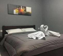 Двухместный номер Standard с балконом и с видом на сад двуспальная кровать в Mai Guesthouse Sanur