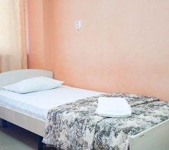 Кровать в 3-местном общем номере в Smart Hotel KDO Пенза