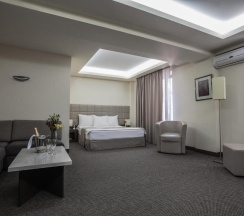 Четырёхместный семейный номер Deluxe в Отель Aviatrans