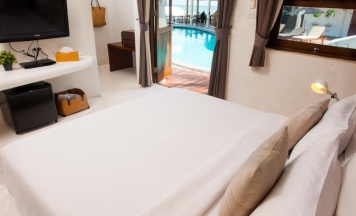 Двухместное бунгало с видом на сад двуспальная кровать в Lazy Days Samui Beach Resort