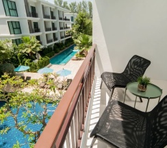 Люкс Comfort c 1 комнатой с видом на бассейн в The Title KR Beach Condotel Rawai Phuket