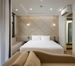 Двухместный номер с доступом к бассейну Deluxe двуспальная кровать в The Proud Karon Beach Phuket Trademark Collection By Wyndham