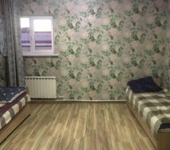 Кровать в общем номере в Алтгост