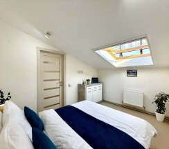 Апартаменты №9 "Люкс" на мансардном этаже в Саквояж