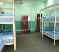 Кровать в общем номере в Близко