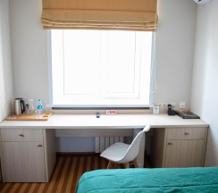 Номер улучшенный стандарт с 1 односпальной кроватью в Хабаровск