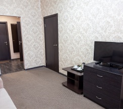 Двухкомнатный люкс с двуспальной кроватью в Рем Отель