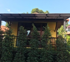 Двухместное бунгало с видом на сад двуспальная кровать в Ricci House Resort
