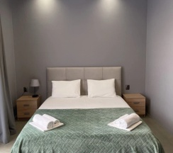 Двухместный полулюкс с балконом и с видом на город двуспальная кровать в Maximus