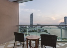 Двухместный люкс c 1 комнатой с видом на реку двуспальная кровать в Chatrium Hotel Riverside Bangkok