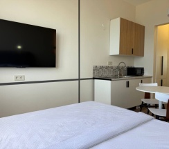 Уютная студия на 13 этаже с панорамным видом на Каспийское море. в Как Дома 05