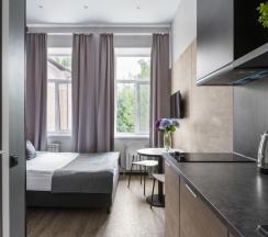 Улучшенный с двуспальной кроватью и мини-кухней в Greenfeel Smolensk