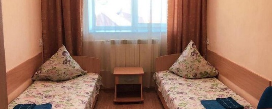 Номер эконом с 2 односпальными кроватями в Мега