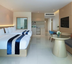 Двухместный номер Grand Deluxe с балконом и с видом на сад двуспальная кровать в Chanalai Flora Resort, Kata Beach