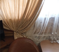 Двуместный номер в деревянном коттедже с cауной в Колыба