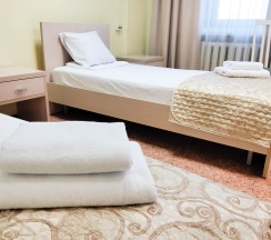 Кровать в 4-местном общем номере в Smart Hotel KDO Тюмень