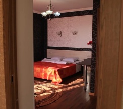 Номер люкс семейный с 1 двуспальной кроватью в Вариант