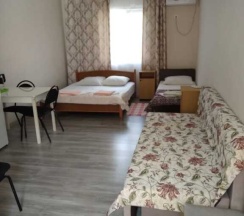 Двухместные семейные апартаменты с 2 комнатами двуспальная кровать в Уютный дворик