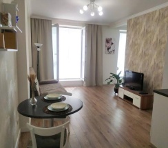 Двухместная студия двуспальная кровать в Апартаменты Румер в современном жилом комплексе у ТЦ Дана Молл