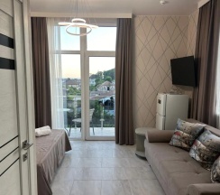 Четырёхместный номер Standard с балконом в Сюзэн