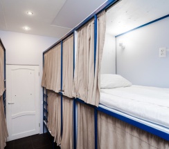 Место в 8-местном общем номере “Русская классика” в BookCase Hostel