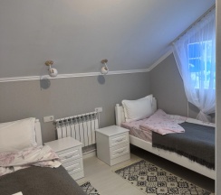 Двухместный номер Стандарт без окна 2 отдельные кровати в В моменте