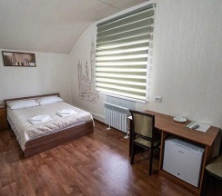 Номер стандарт с 1 двуспальной кроватью в На Тихом Дону