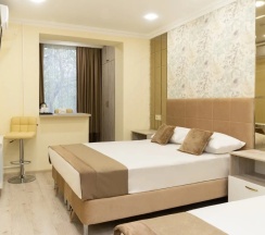 Трёхместный люкс в Family Inn