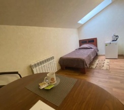 Номер стандарт с 1 односпальной кроватью (мансарда) в Колесо