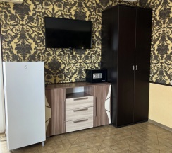 Четырёхместный семейный номер Superior с балконом и с красивым видом из окна в Morskoy priboy