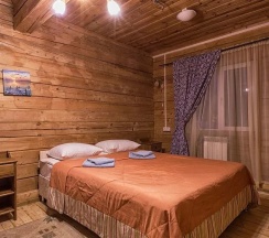 Шестиместный коттедж Богатырский с балконом в Ателика Улиткино