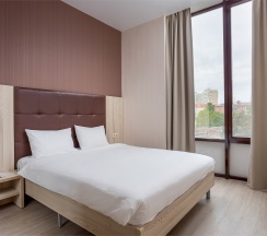 Апартаменты Делюкс с кроватью King-size и раскладным диваном в Tulip hotel apartments