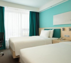 Номер стандарт с 2 односпальными кроватями в Hampton by Hilton Moscow Strogino